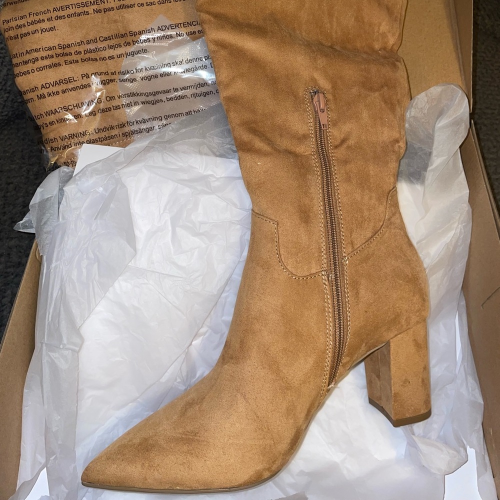 Brand New Heeled knee high boots